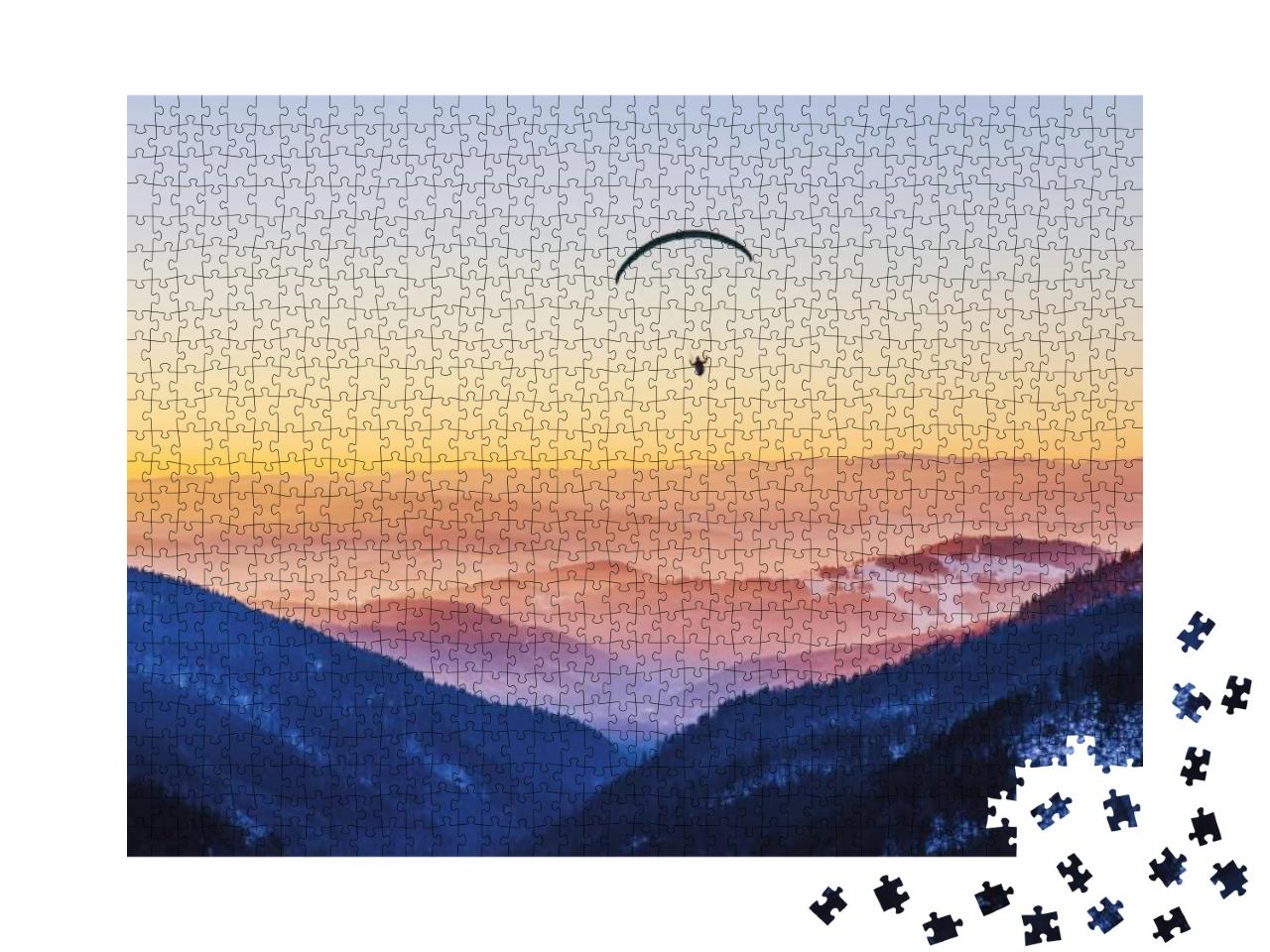 Puzzle 1000 Teile „Mit dem Gleitschirm in den Sonnuntergang“