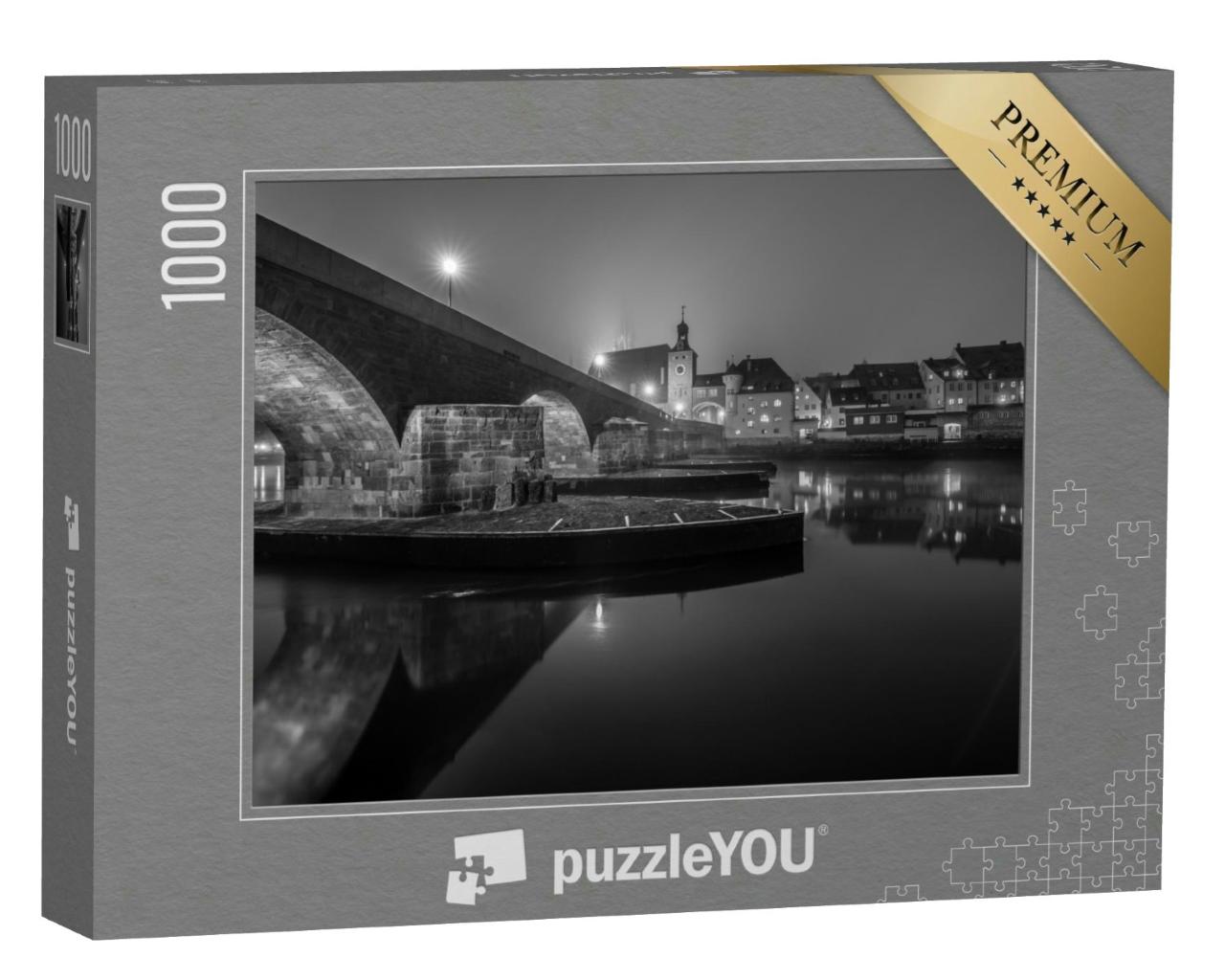 Puzzle 1000 Teile „Blick auf die Steinbrücke in Regensburg bei Nacht“