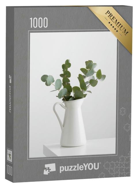 Puzzle 1000 Teile „Eukalyptuszweige in einer Vase auf einem weißen Tisch“