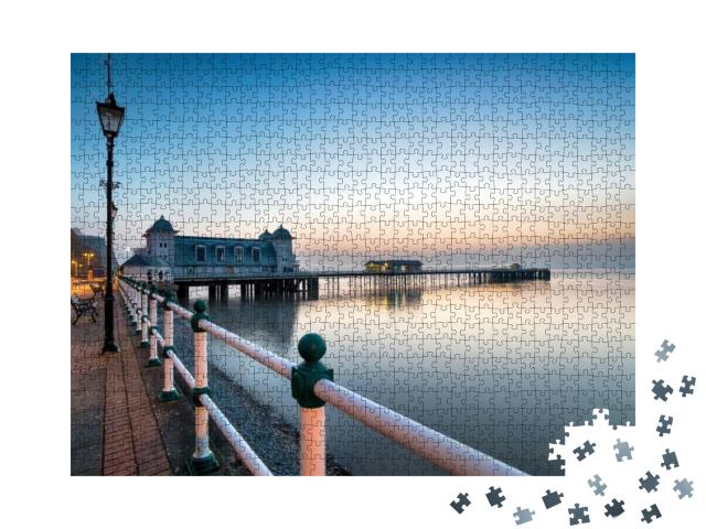 Puzzle 1000 Teile „Morgendämmerung am Penarth Pier bei Cardiff, Wales“