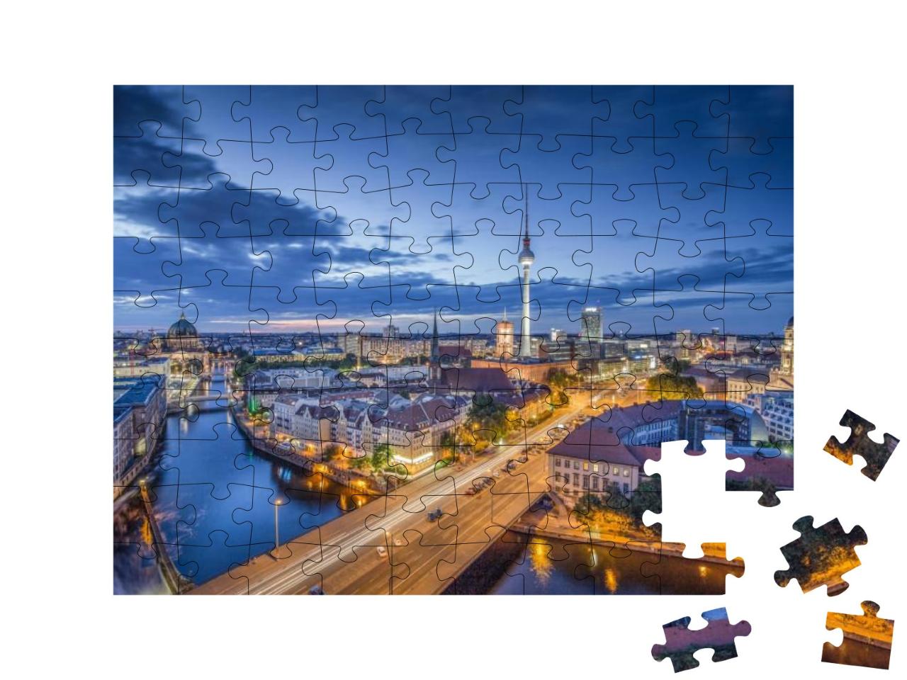 Puzzle 100 Teile „Blick über Berlin am Abend“