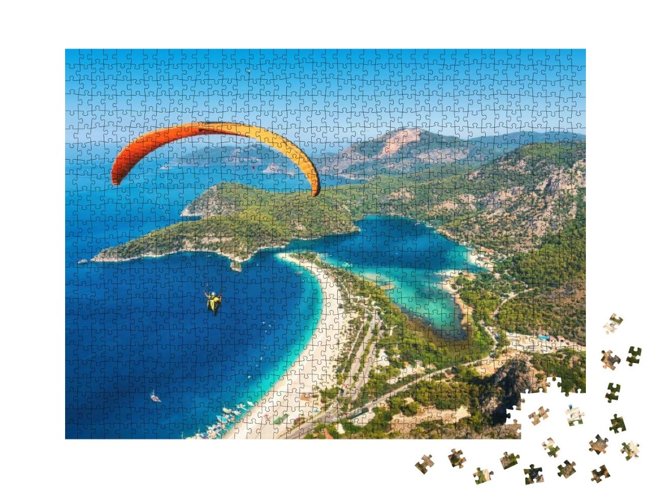 Puzzle 1000 Teile „Gleitschirmflug über der Blauen Lagune in Oludeniz, Türkei“