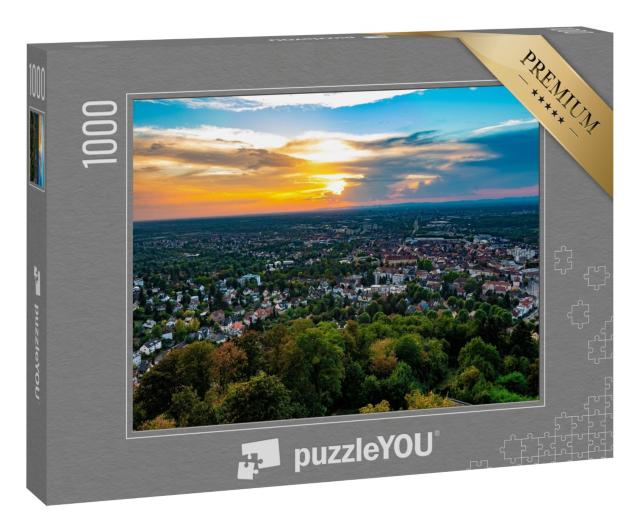 Puzzle 1000 Teile „Sturmwolken im Sonnenuntergang über Karlsruhe“